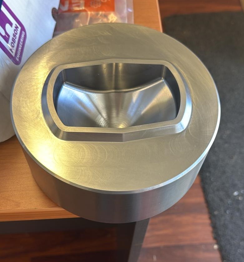 Precision-machined insert die for a twist-lock pin — turned and milled in-house at Enex Engineering, Malaga