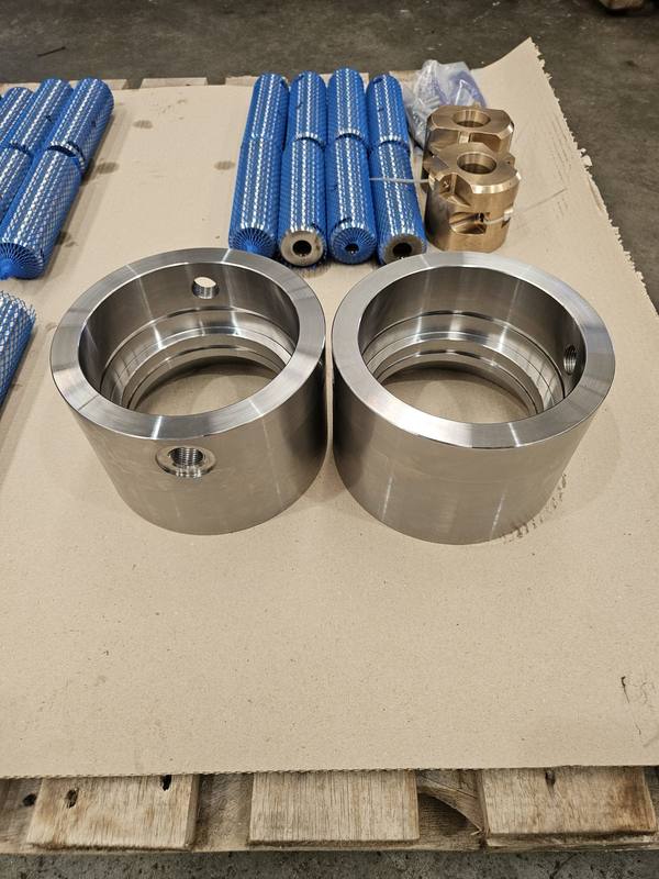 Pair of machined cylinder housings ready for assembly